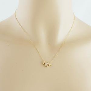 Two Tiny Gold Initials With Ampersand Necklace..