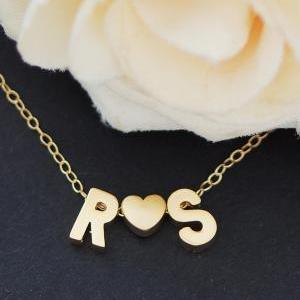 Two Tiny Gold Initials With Gold Heart Necklace..