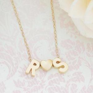 Two Tiny Gold Initials With Gold Heart Necklace..