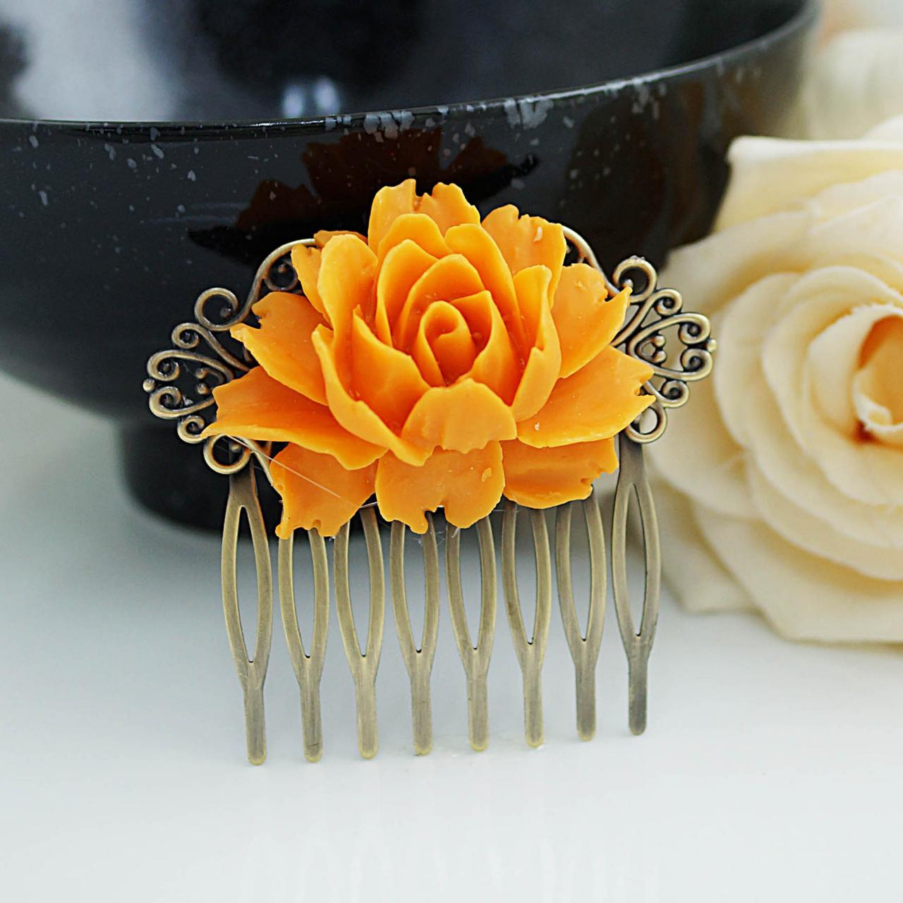 orange flower hair clips weddings